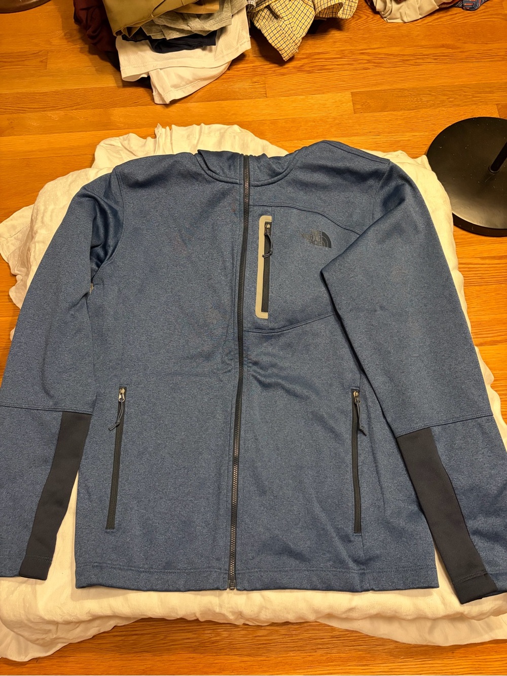 The North Face Men's Blue Performance Softshell Jacket with Black Accents